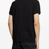 Polo con applicazione logo in nero Moncler - uomo 