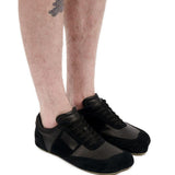 Sneakers con grafica numerica in nero 