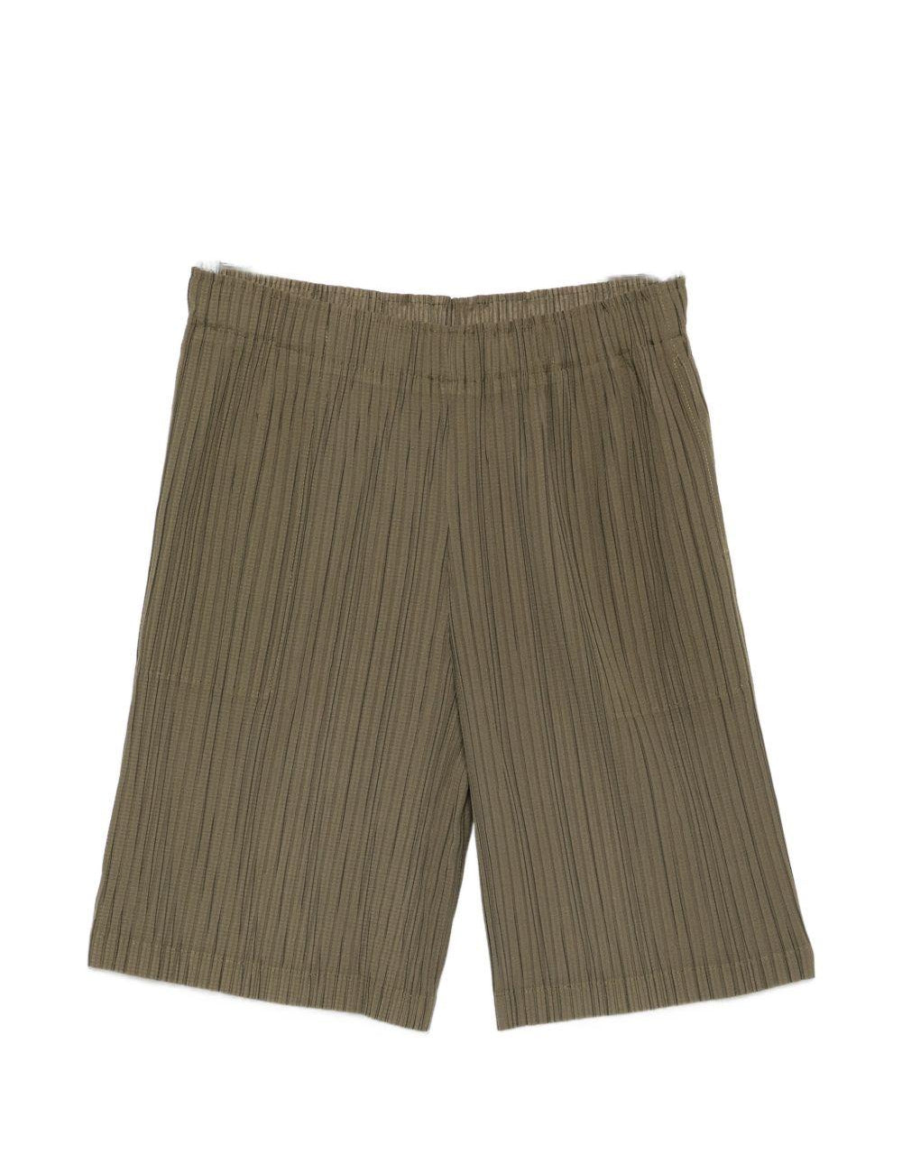 Pantaloncini elasticizzati con pieghe in verde Gongdid design - uomo 