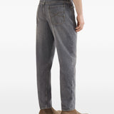 Jeans a cinque tasche in denim grigio con vestibilità iconica. In grigio Brunello cucinelli - uomo 