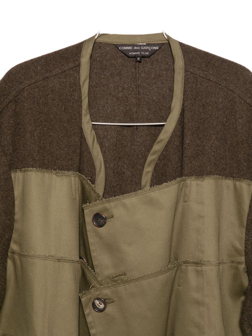 Cappotto con design a pannelli in verde Comme des garcons homme - uomo 