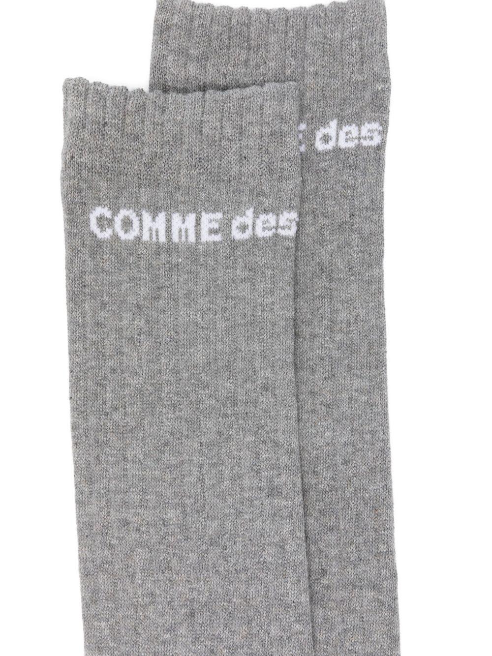 Calzini alti con logo in grigio Comme des garcons homme plus - uomo 