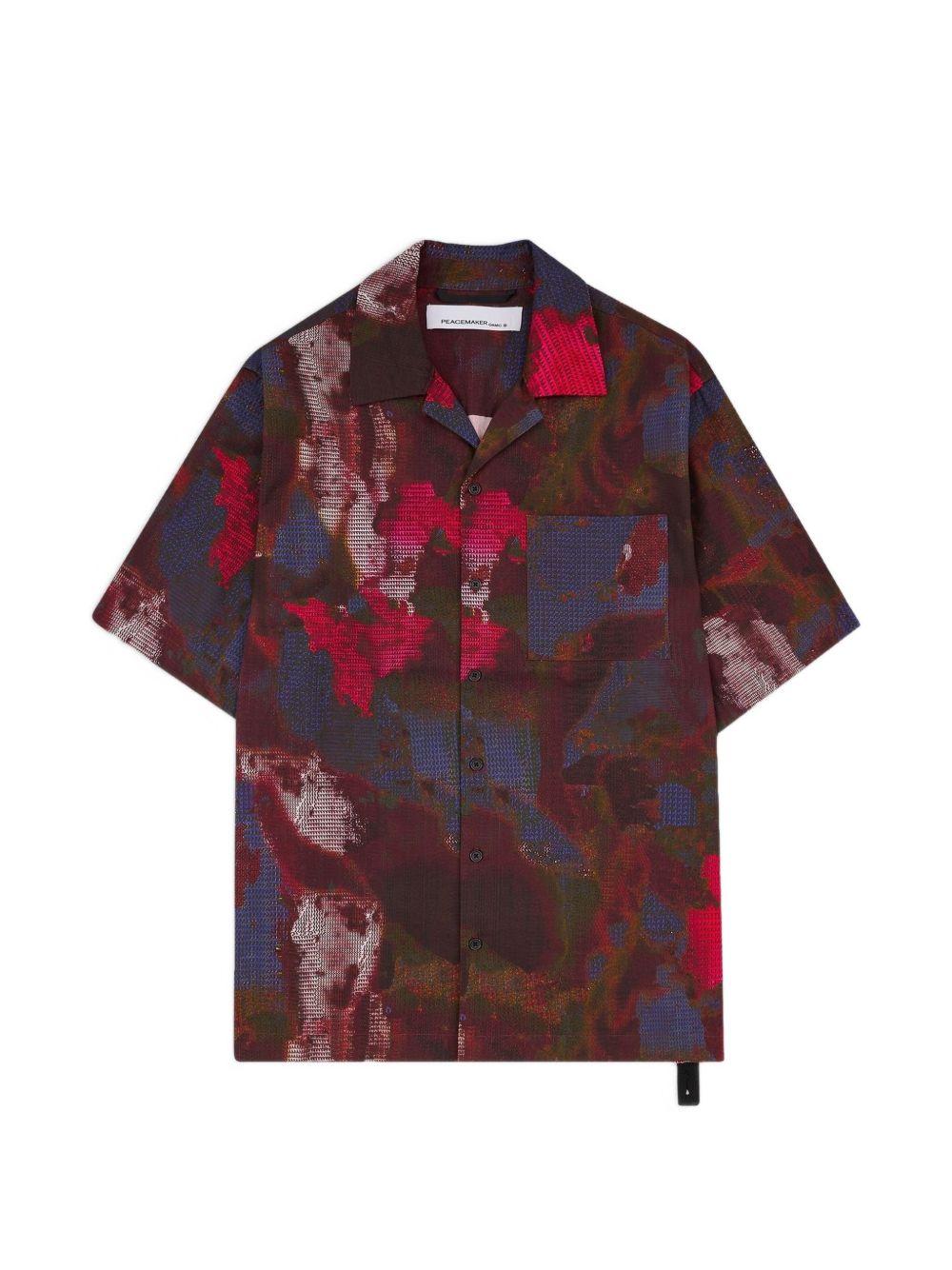 Camicia con stampa all-over in rosso e multicolore Oamc peacemaker - uomo 