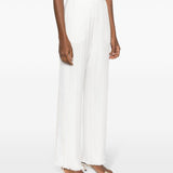 Pantaloni dritti con pieghe in bianco - donna 
