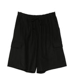 Pantaloncini cargo con coulisse in nero Comme des garcons homme - uomo 