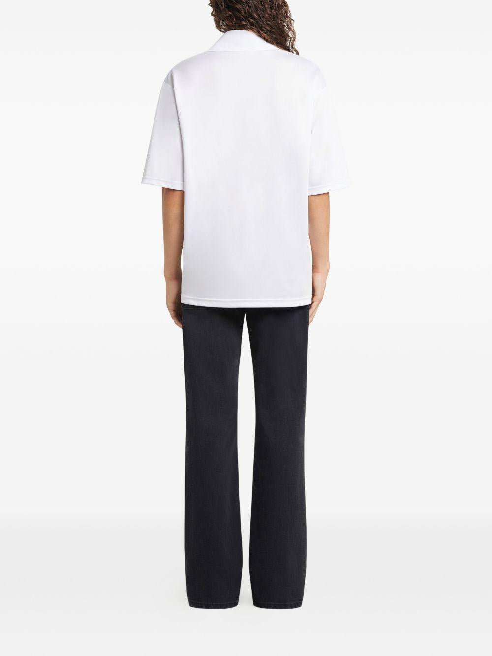 Polo con logo in bianco Courrèges - donna 