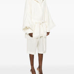 Cappotto con frange e cintura in bianco Batakovic - donna 