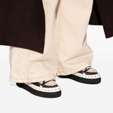 Stivali stringati con borchie in beige Inuikii - donna 