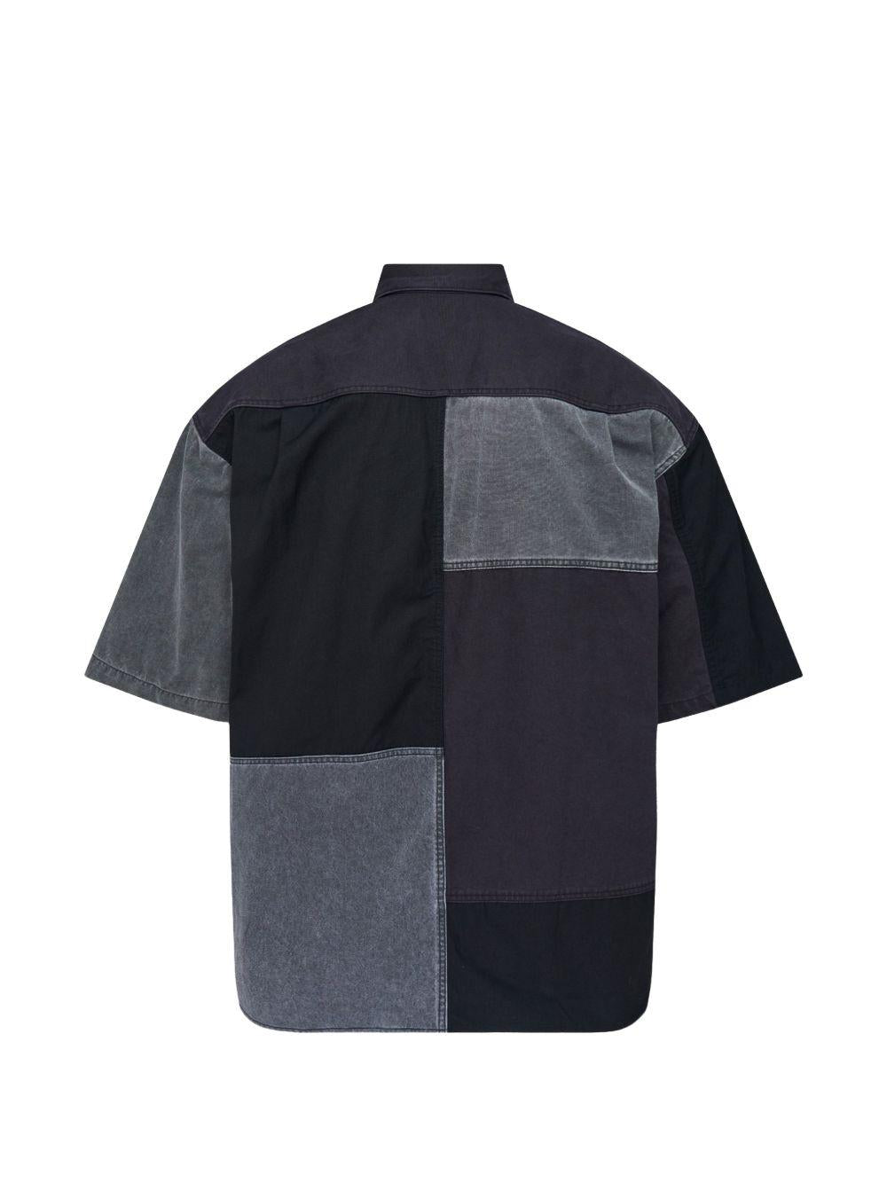 Camicia a maniche corte con design patchwork in nero Comme des garcons homme - uomo 