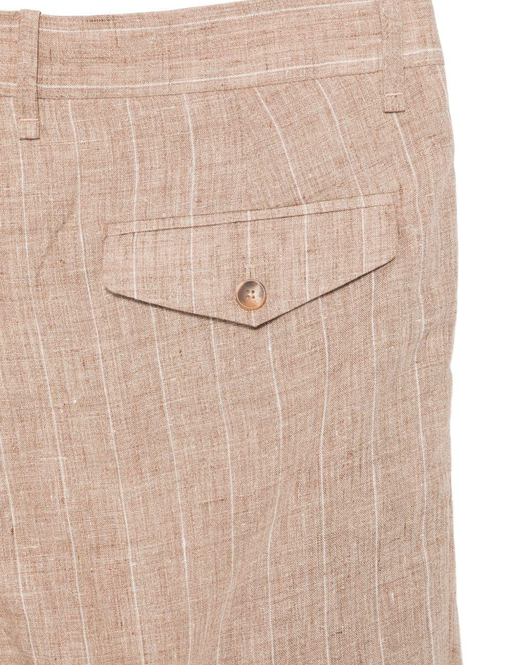Pantaloni a righe in beige Simkhai - uomo 