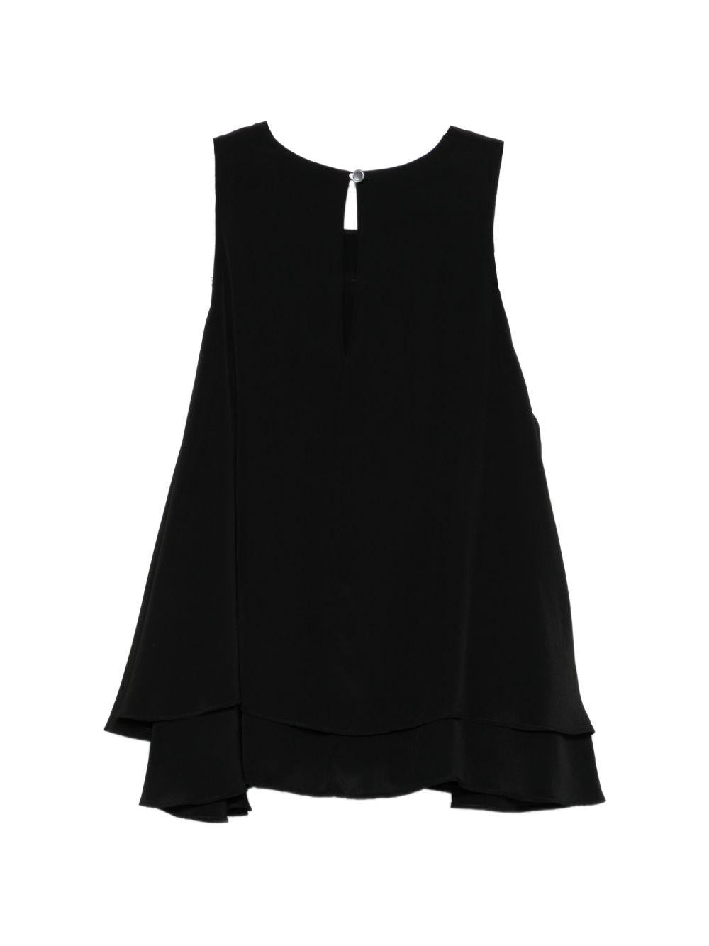 Top con ruchesi in nero 