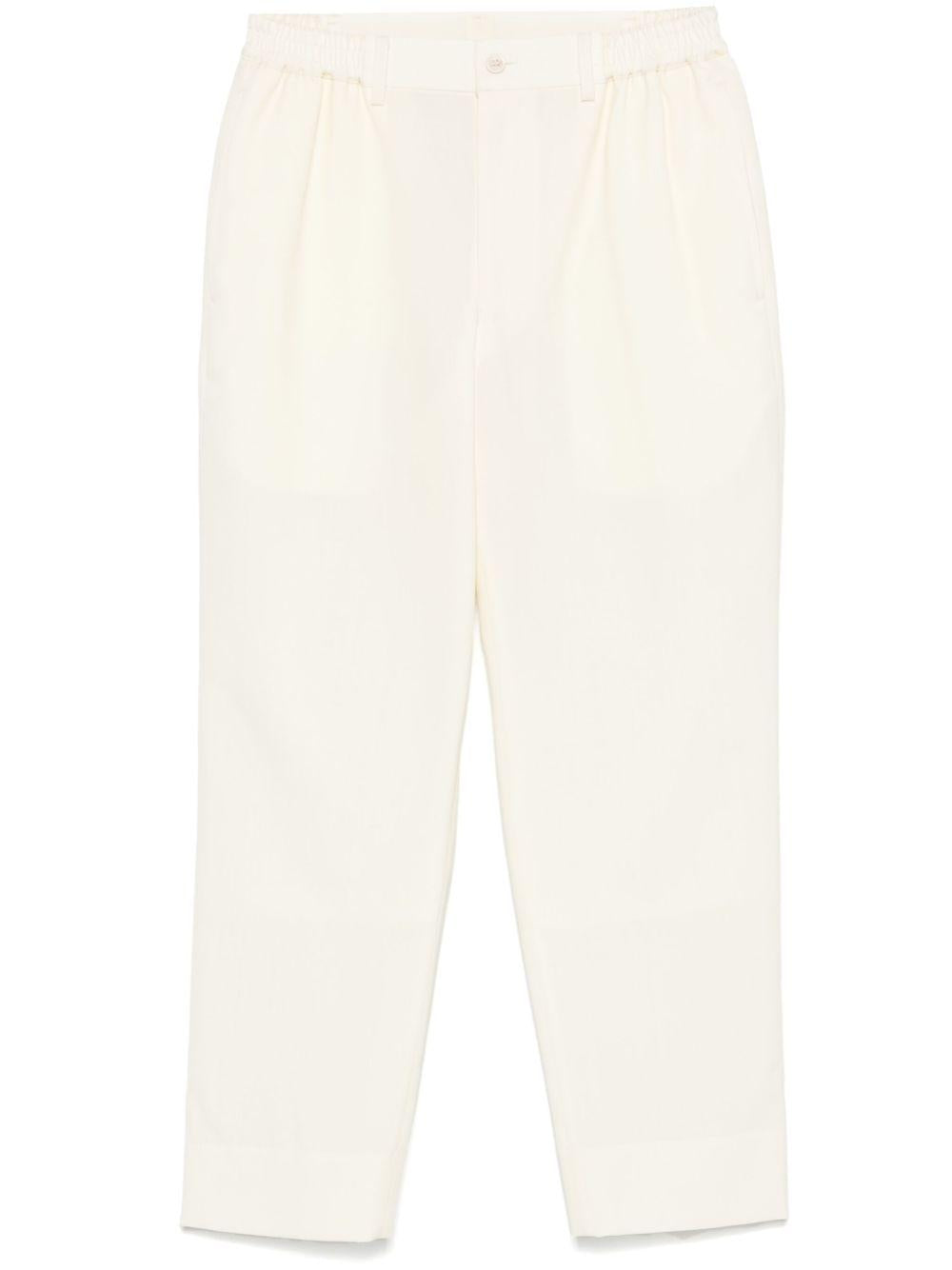 Pantaloni affusolati in bianco Comme Des Garçons - donna 