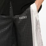 Pantaloncini con coulisse a quadri in nero Amiri - uomo 