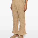 Pantaloni plissettati in beige gongdid design - donna 
