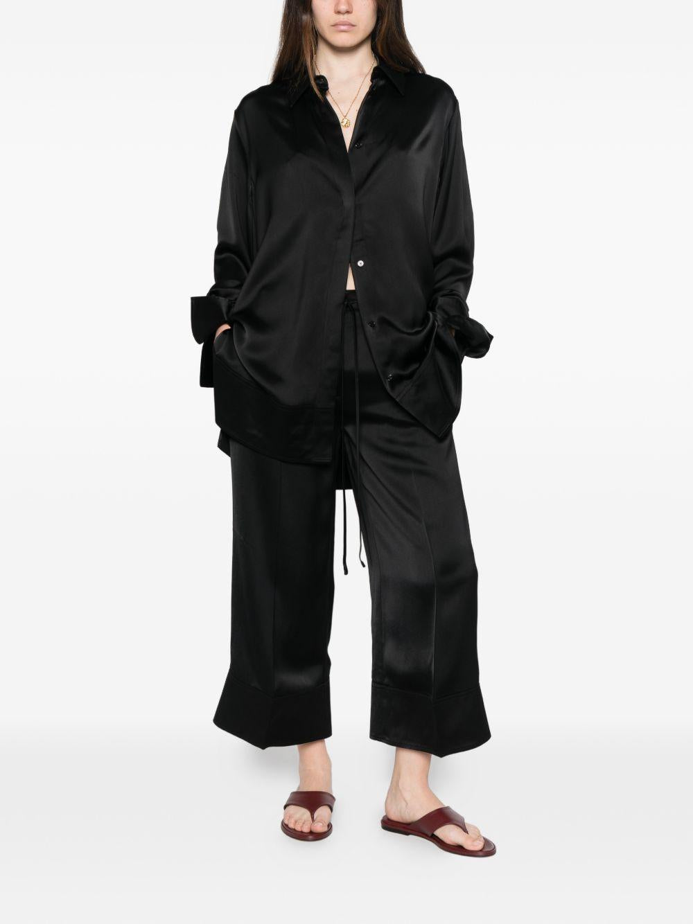 Pantaloni satinati con coulisse in nero Toteme - donna 