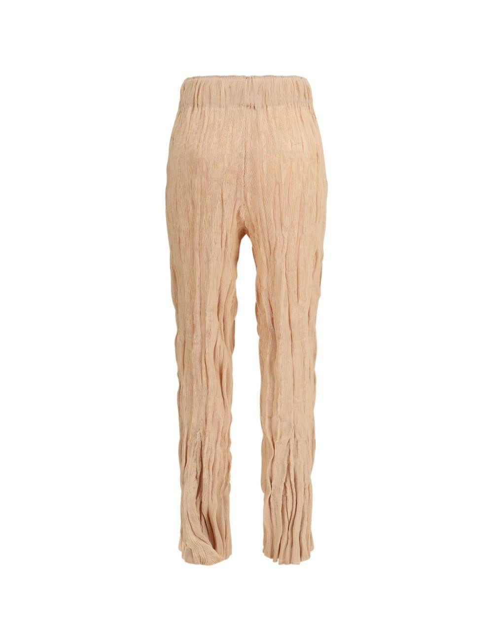 Pantaloni plissettati in rosa pesca gongdid design - donna 
