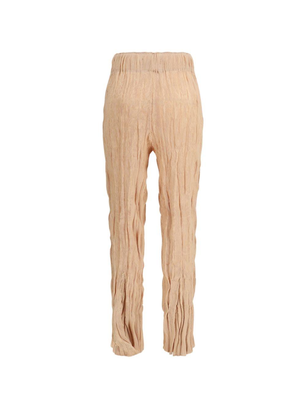 Pantaloni plissettati in rosa pesca gongdid design - donna 