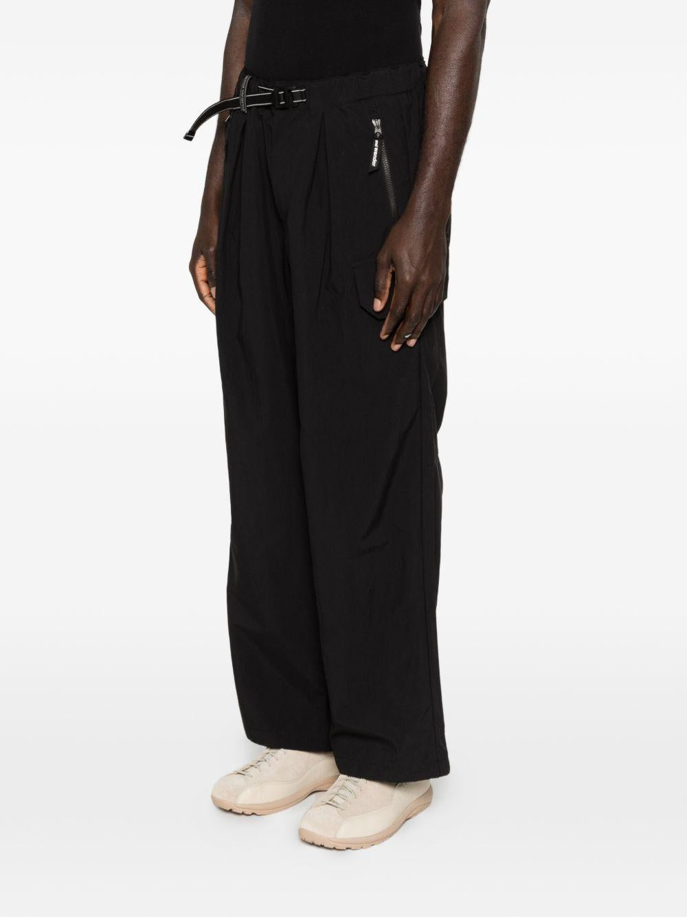 Pantaloni con tasche in nero and Wander - uomo 