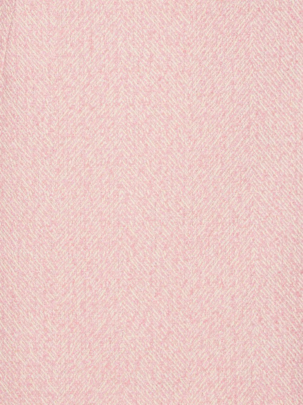 Gonna mini boucle in rosa 