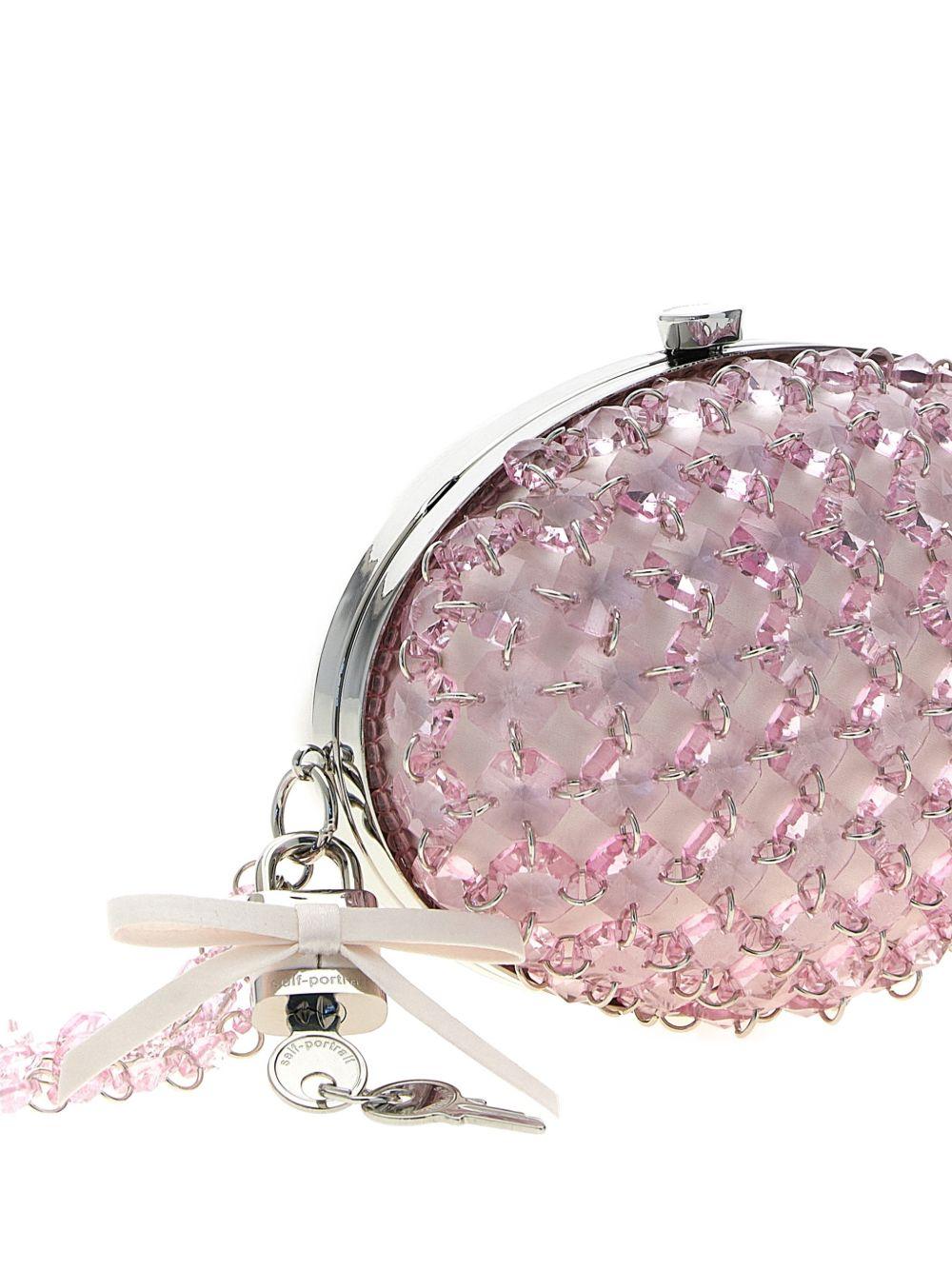 Borsa ovale con catena di cristalli in rosa 