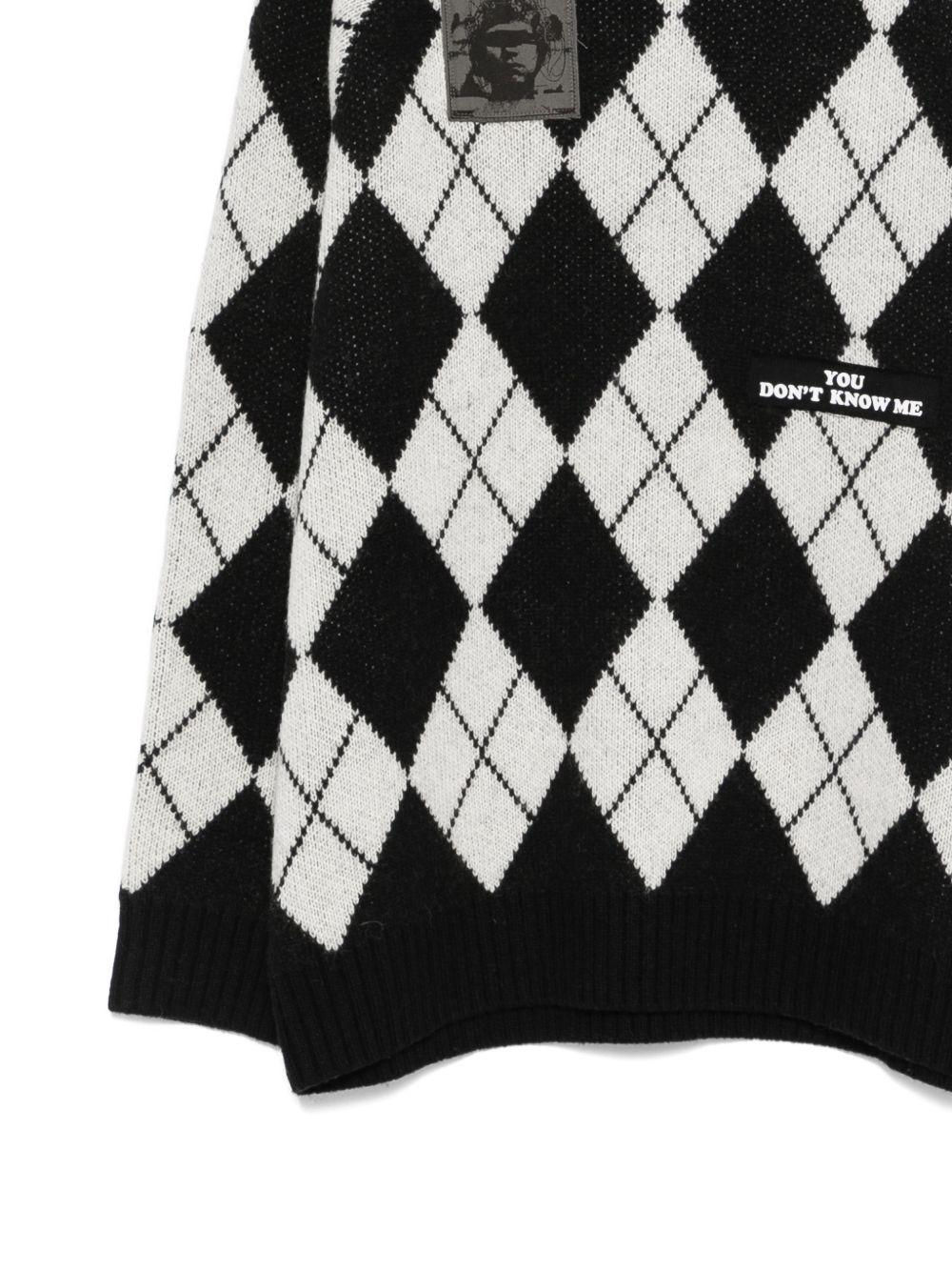 Maglione a rombi in nero Undercover - uomo 
