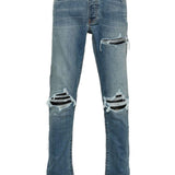 Jeans con strappi in blu 