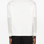 T-shirt a maniche lunghe con tasca in bianco And wander - uomo 