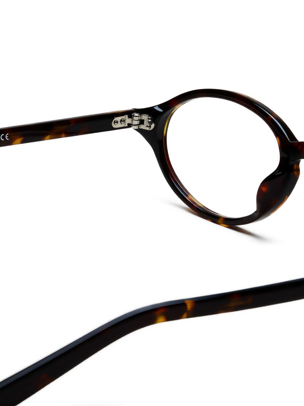 Occhiali lex con montatura ovale e rivetti in metallo in marrone Chimi - unisex 