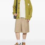 Shorts gessati con pieghe in beige Ami paris - uomo 