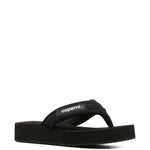 Ciabatte con logo in nero Coperni - donna 