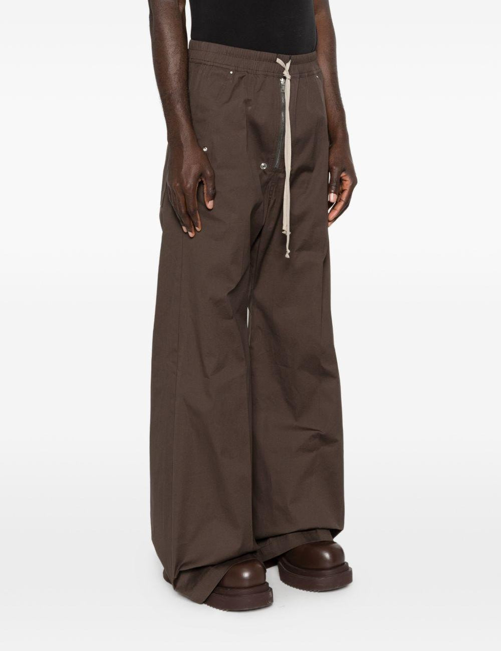 Pantaloni con dettaglio zip in grigio Rick owens - uomo 