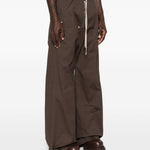 Pantaloni con dettaglio zip in grigio Rick owens - uomo 