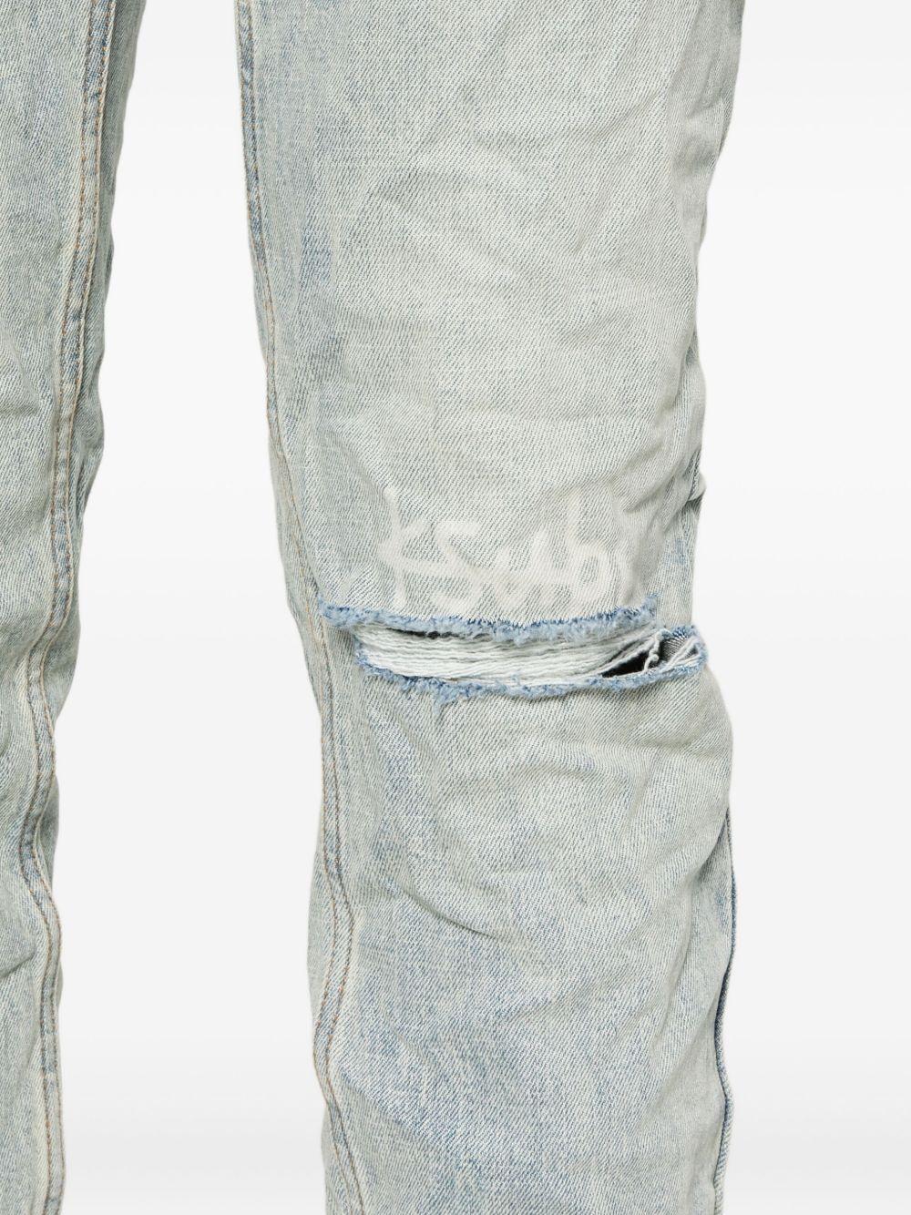 Jeans con dettagli effetto antiquato in blu Ksubi - uomo 