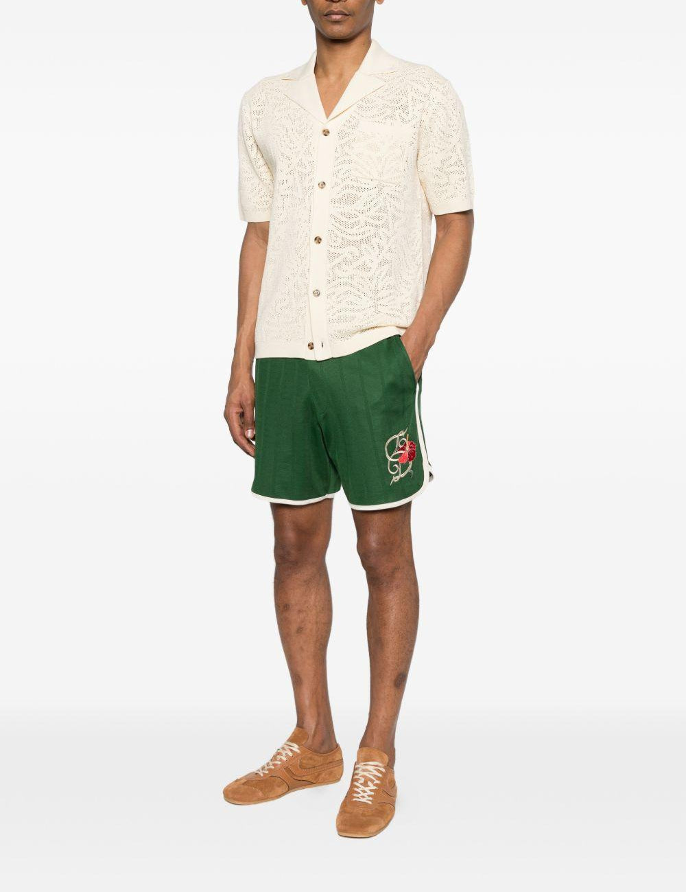 Shorts sportivi con logo in verde Drole de monsieur - uomo 