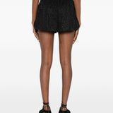 Shorts lamé in nero Oséree - donna 