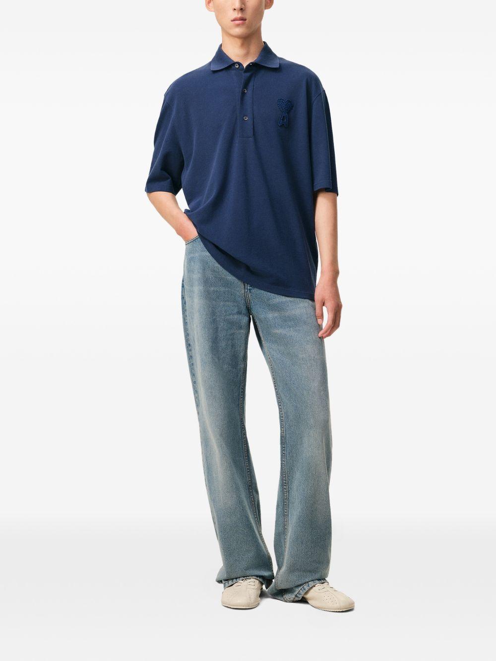 Polo Ami de Coeur con applicazione in blu Ami paris - uomo 