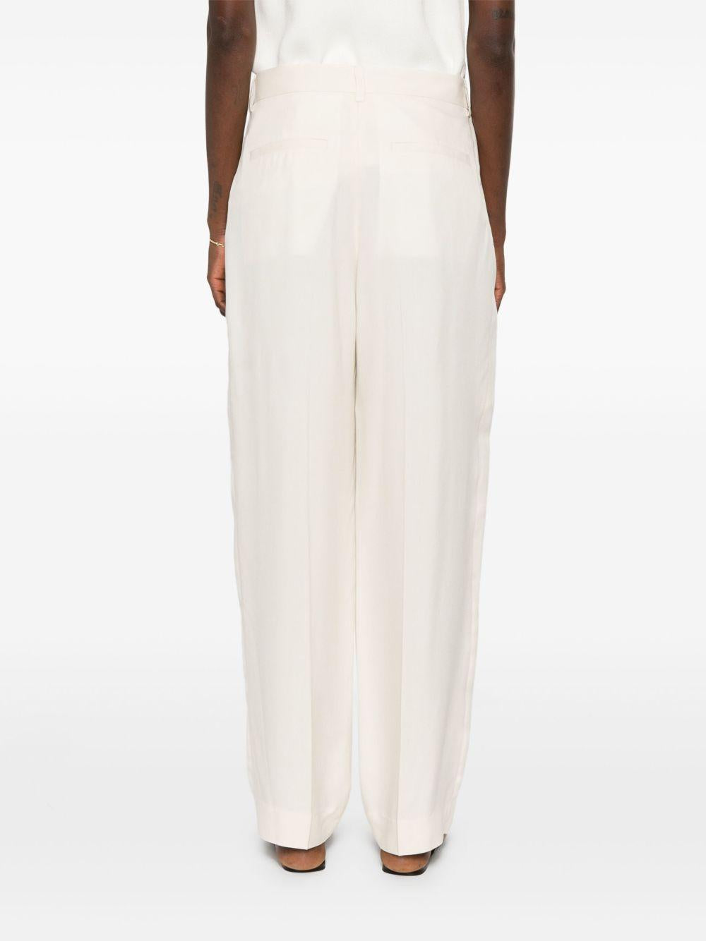 Pantaloni fluidi a doppia piega in bianco Toteme - donna 