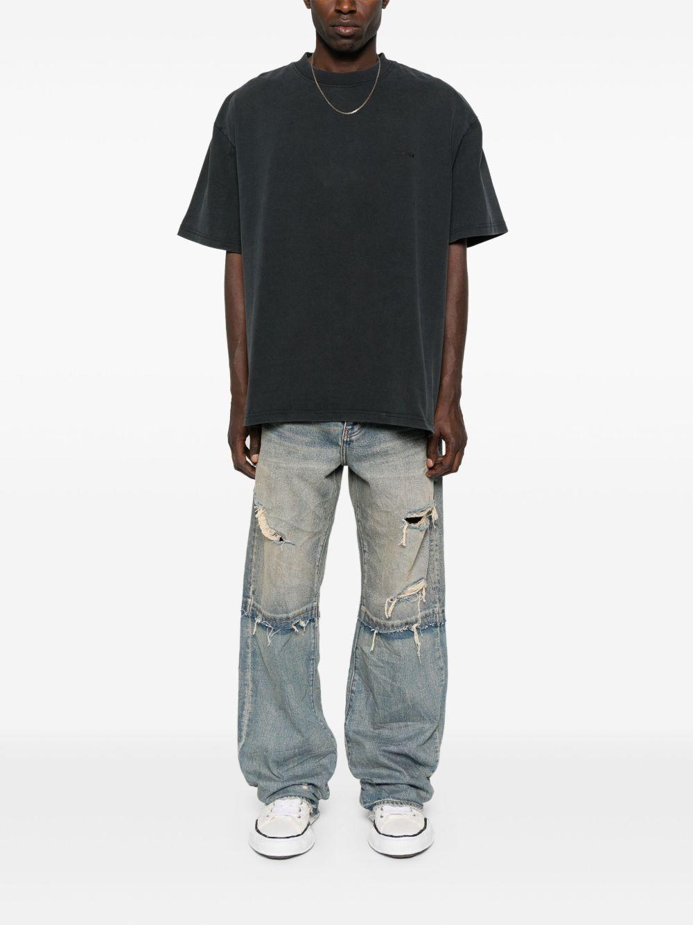 Jeans a gamba ampia con effetto vissuto in blu Purple - uomo 