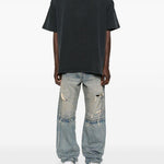 Jeans a gamba ampia con effetto vissuto in blu Purple - uomo 