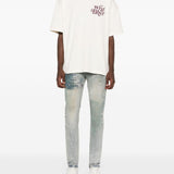 Jeans con effetto vissuto in blu Purple - uomo 