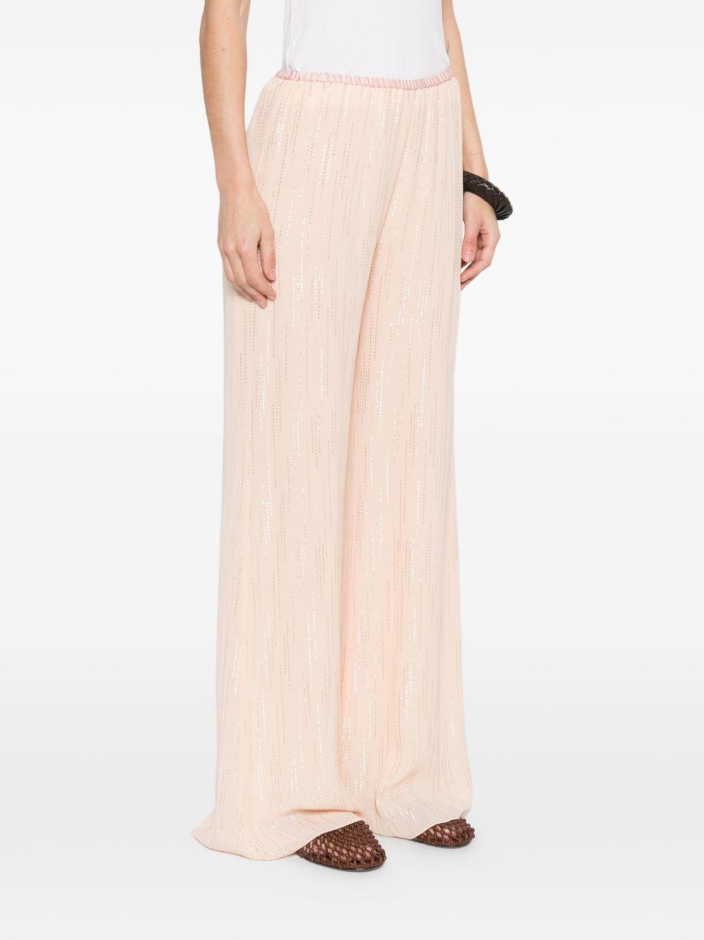 Pantaloni a palazzo con vita elasticata in rosa Forte forte - donna 