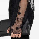 Blusa trasparente con ricamo a fiori in nero Toteme - donna 