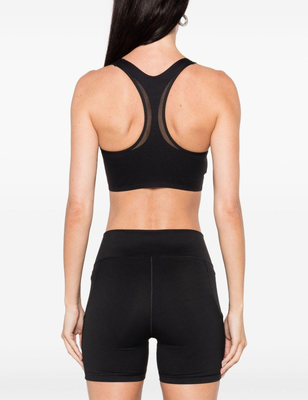 Top sportivo con logo in nero Adidas by stella mc cartney  - donna 