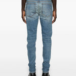 Jeans con strappi in blu 