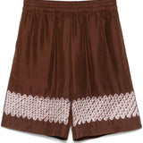 Shorts con stampa grafica in marrone Feng chen wang - uomo 