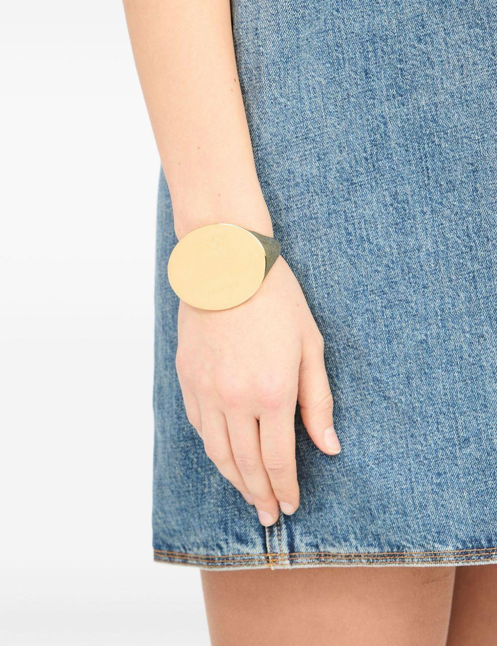 Bracciale con logo inciso in oro Mm6 maison margiela - donna 