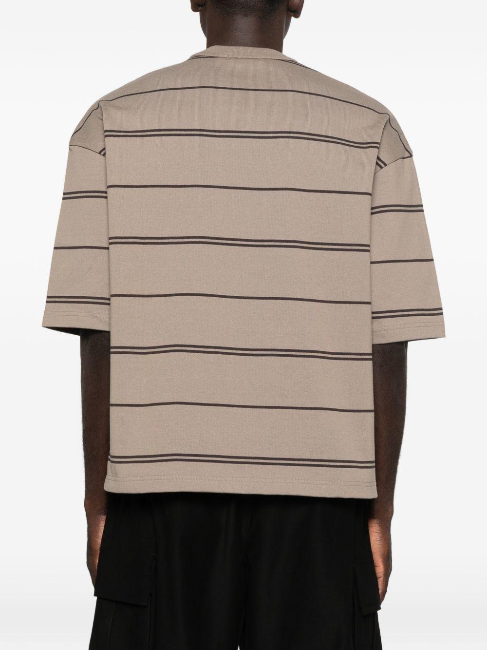T-shirt a righe con taschino sul petto in beige Comme des garcons homme - uomo 