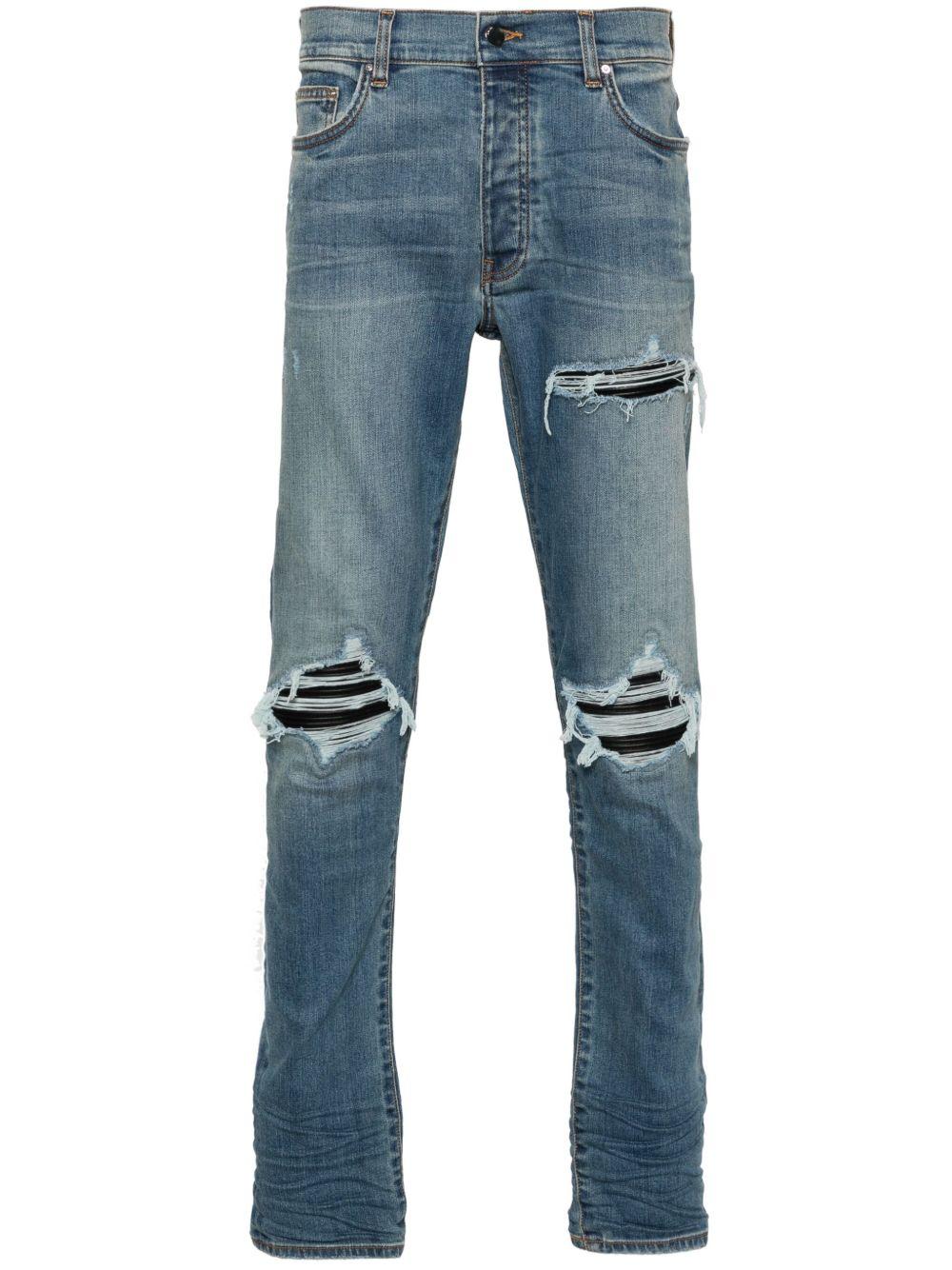Jeans con strappi in blu 