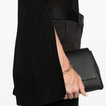 Maglione a collo alto con spacchi in nero Toteme - donna 