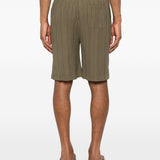 Pantaloncini elasticizzati con pieghe in verde Gongdid design - uomo 